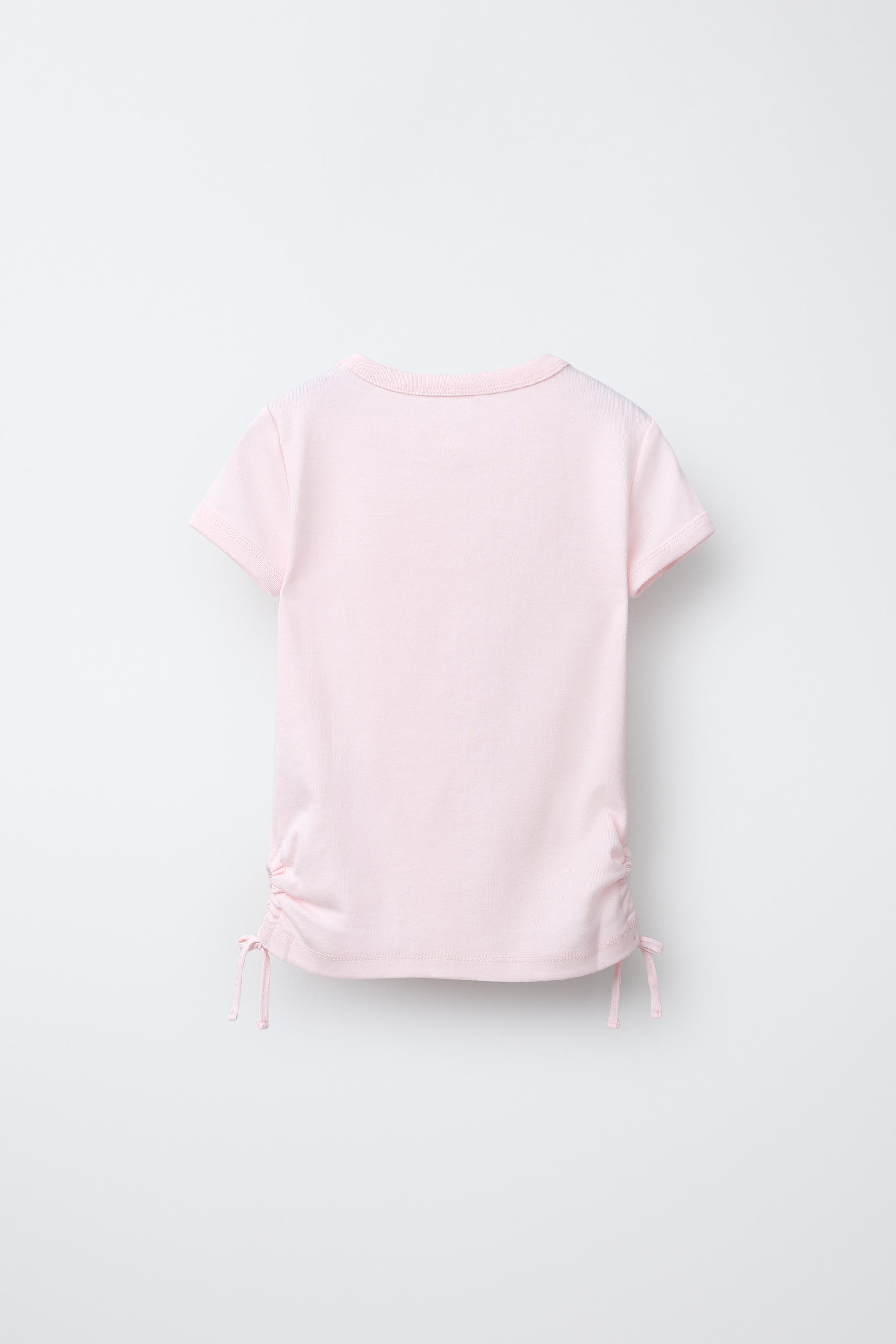MODAL T-SHIRT WITH CUT OUTS AND BOWS